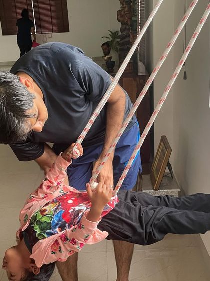 Another moment of playful exploration on the yoga ropes. I guide each child to feel safe and confident as they discover what their bodies can do.