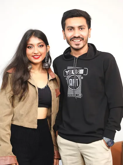 A photo with the host after recording a podcast. I had a great time sharing my story and talking about my journey in the music industry.
