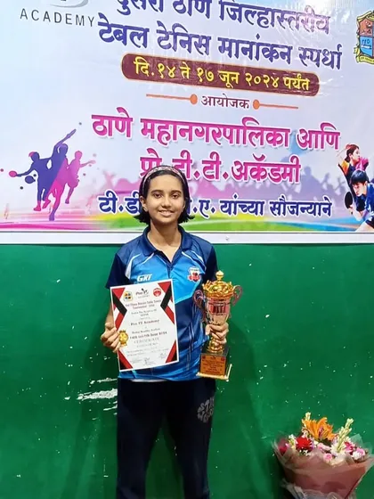 Anvi Thorat holds her trophy after dominating the field to win the gold medal in the U-15 Girls category at the 2nd District Ranking.