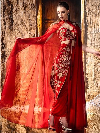 The texture of the stone wall and the flowing crimson cape are the heroes here. This was achieved by projecting a rustic backdrop and using light to capture the motion and detail of the fabric, suspending a moment in time.