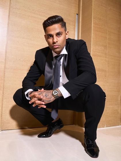 Cricketer Suryakumar Yadav in a sharp Rohit Gandhi Rahul Khanna tuxedo. The satin lapels and tie give it a classic, polished finish perfect for a formal event.