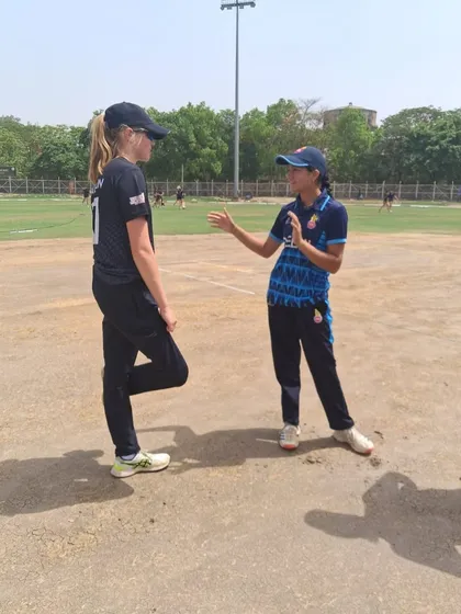 Building bridges through sport. Another candid moment of our player interacting with an opponent from the New Zealand team. This kind of cultural exchange and sportsmanship is something we deeply encourage.