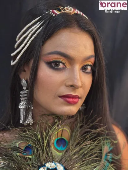 A cocktail party makeup look inspired by Arabic styles, featuring a warm, sunset-toned eyeshadow and dramatic winged liner.