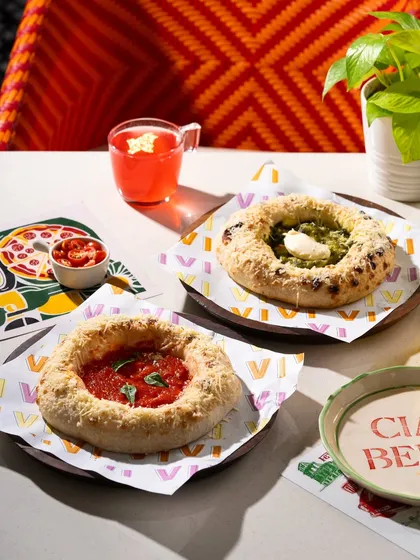 Unique "pizzettes" or small pizzas with a thick, cheesy crust. A fun and modern take on pizza.