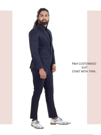 A side profile of the navy blue suit, showing its sleek and timeless silhouette.