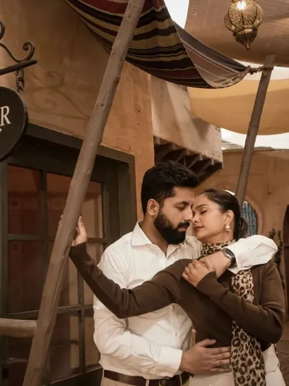 A romantic embrace in a stylized alleyway designed to look like a Middle Eastern souk. This showcases our ability to create a destination feel even in a studio setting.