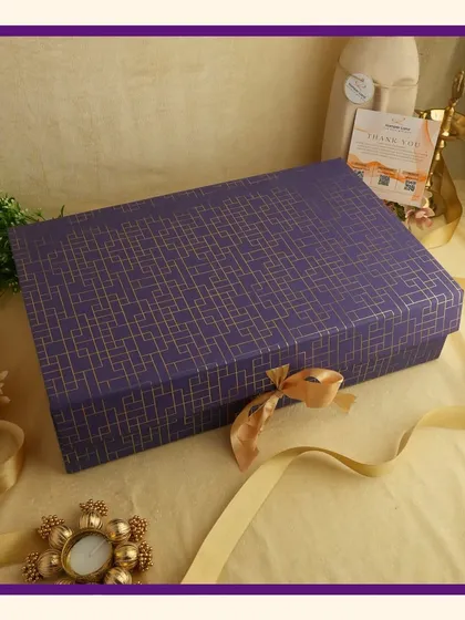 Celebrating Navratri with a royal purple theme. This elegant box is filled with premium goodies, perfect for gifting as you prepare for the upcoming Diwali festivities.