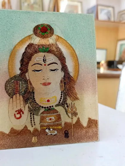I created this portrait of Lord Shiva to evoke a sense of deep calm and meditative focus. The subtle tones from the gemstones reflect his ascetic nature, making this piece ideal for a space dedicated to reflection and spiritual practice.