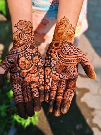 A beautiful stain photo of a bridal design, captured outdoors. The natural light brings out the richness of the color, showing the lovely result a day or two after application.