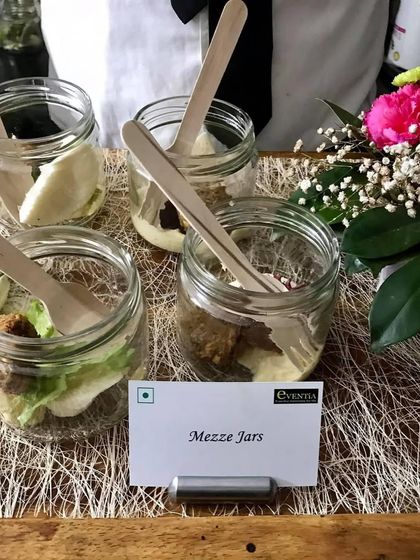 Individual Mezze Jars served at a Lohri party. This modern presentation is not only stylish but also convenient for guests to enjoy while mingling.