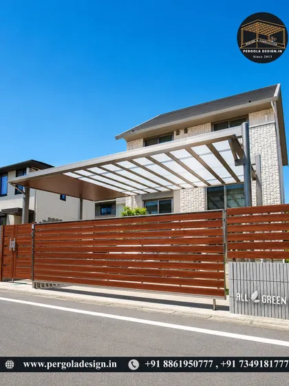 A street-side view of a modern carport with a polycarbonate roof and a stylish wooden slatted fence. This combination offers both vehicle protection and enhanced privacy, creating a secure and aesthetically pleasing boundary for the property.