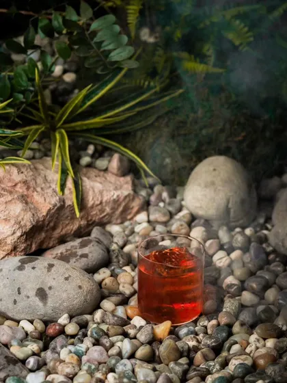 Our designs do more than just look good; they create experiences. This shot from our Zen garden project at Arigato restaurant shows how the green backdrop becomes an Insta-worthy setting, adding direct value for our hospitality clients.