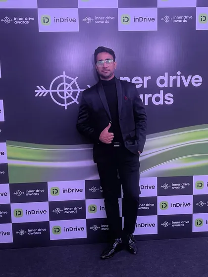 A confident pose at the inDrive event, reflecting the energy I bring to every performance.