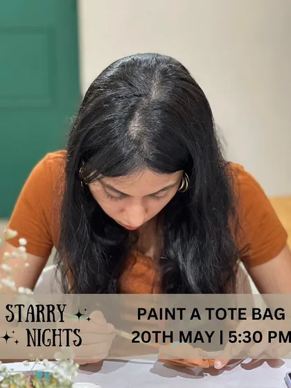 Get lost in the creative flow. A guest is completely focused on her tote bag design during a Starry Nights workshop. Our terrace provides a peaceful escape where you can truly immerse yourself in your art.