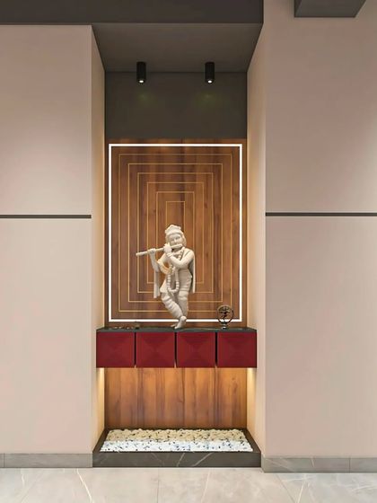 A serene pooja corner integrated into a modern office design. The backlit wooden panel and Krishna idol create a peaceful and spiritual focal point.