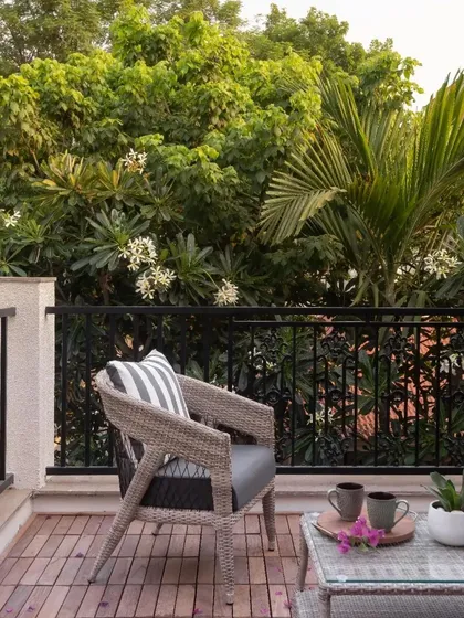 Another view of the comfortable and stylish outdoor chair, perfect for enjoying a morning coffee on the deck.