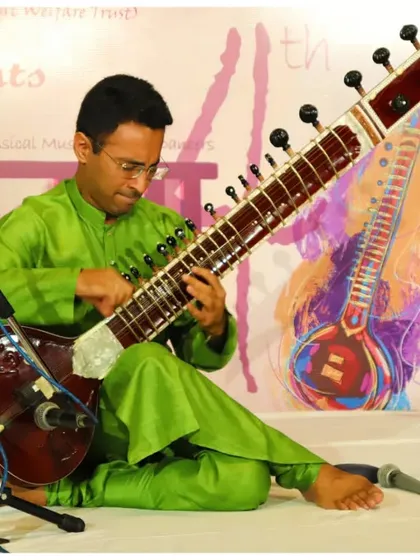 A full view of my performance posture and stage presence during a traditional concert.