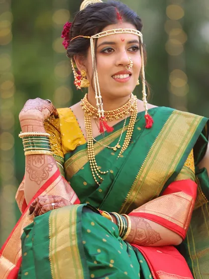 A relaxed portrait of the bride. Her makeup is minimal and fresh, perfect for a daytime wedding ceremony, ensuring she feels comfortable and looks timeless.