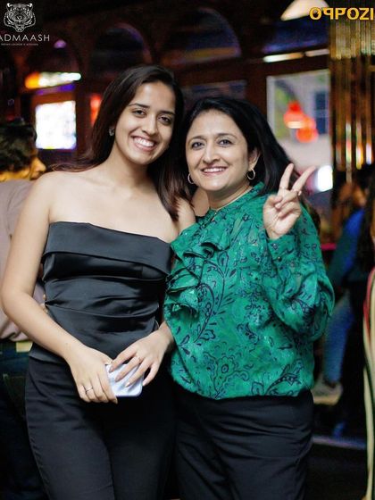A mother and daughter enjoying the music.