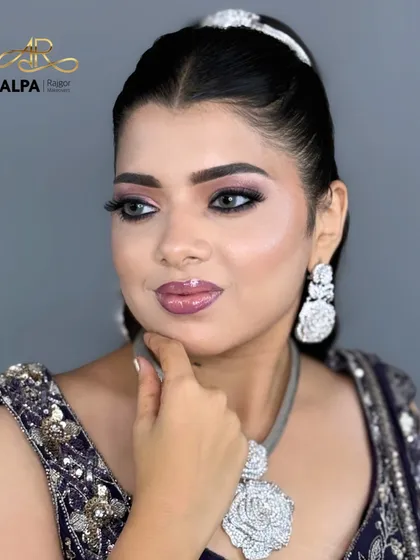 A confident portrait showing the complete purple-themed Sangeet look.