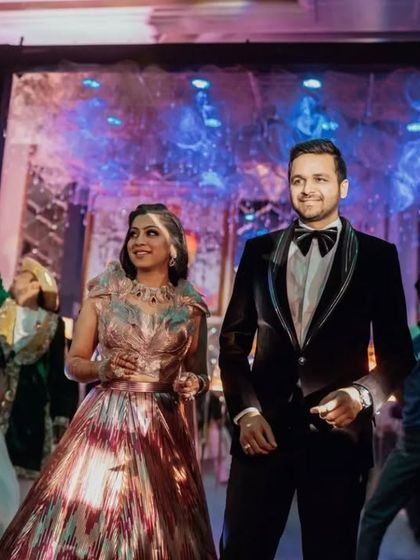 A Bollywood-themed entry for this lovely couple. I can create entries based on your favorite movies or songs.