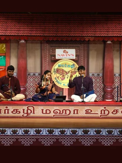 Performing for the Margazhi Maha Utsavam, a televised concert series. The traditional stage setup, resembling an old heritage home, provided a beautiful backdrop for our classical music presentation.