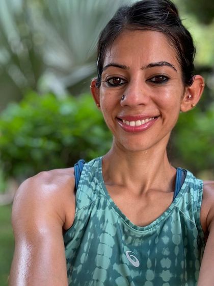 A close-up selfie, sweaty and smiling after a run. This is the raw, unfiltered joy of pushing your body and feeling alive.