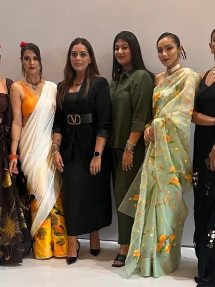 Posing with the models I styled for a designer's collection at fashion week. It's so rewarding to see the complete looks come together on the runway.