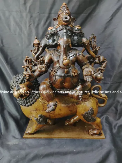 A frontal view of the Heramba Ganapati wax model. Each of the five heads is distinctly sculpted, showcasing our ability to handle complex iconographic requirements.