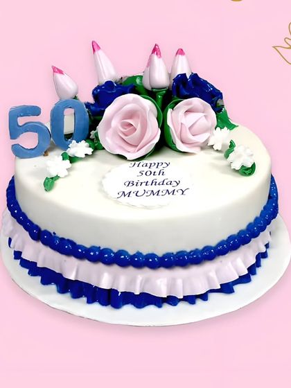 An elegant cake for a 50th birthday, decorated with beautiful pink and blue sugar roses. This classic design is a wonderful way to celebrate a momentous milestone.