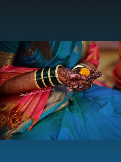The stunning stain of a bridal mehendi, seen during a traditional ritual. The deep color is a result of my all-natural henna and the bride's care.