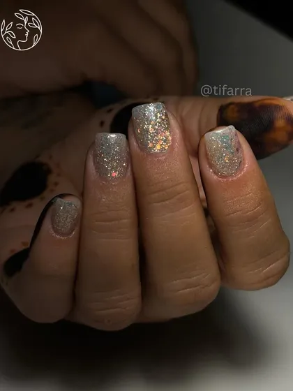 All that glitters. A simple but stunning set of square-shaped nails with full-coverage holographic glitter.