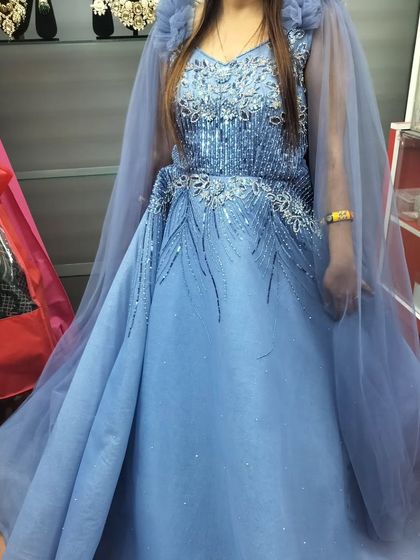 This powder blue gown is another gorgeous option for your engagement or reception. The intricate beadwork on the bodice is simply stunning.