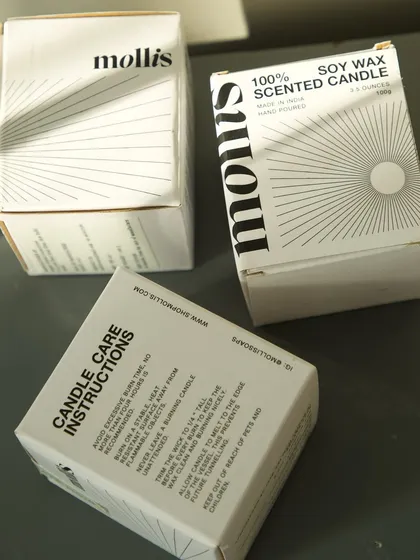 The striking black and white design of my candle boxes is as intentional as the product itself.