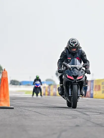 Focus is everything. A student practices drills at Kari Motor Speedway, learning to block out distractions and concentrate on the next marker. This is a core skill we teach.