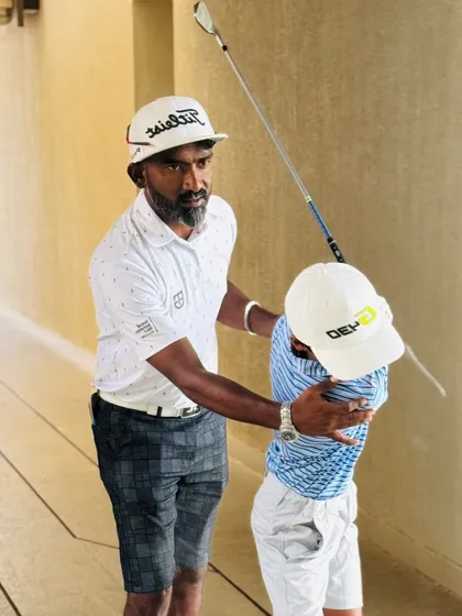 Our coaches are constantly on the range, providing hands-on instruction. From demonstrating a swing path to analyzing a student's setup, these moments of direct mentorship are where real progress is made.