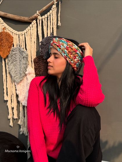 A closer look at the texture and colors of our handmade winter headband. We choose yarn blends that are both warm and incredibly soft against the skin.