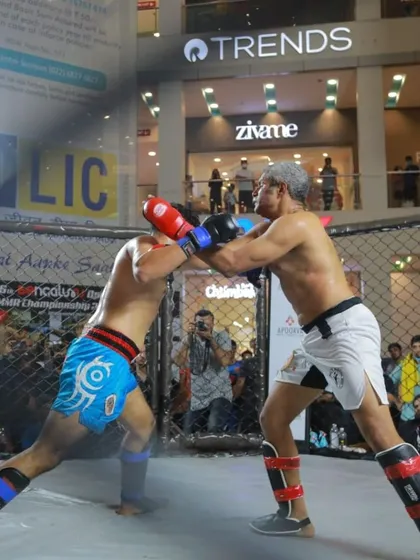 Our founder and head coach, Ashwin Naidu, leads from the front, not the sidelines. This is him competing in the 6th Bengaluru Open MMA Championship, demonstrating the effectiveness of our mixed martial arts training program inside the cage.