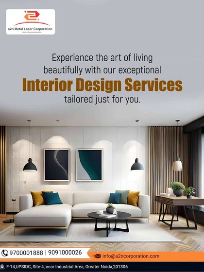 A modern living room with a white L-shaped sectional sofa, accented with colorful cushions. The space is defined by clean lines, simple artwork, and elegant pendant lighting, creating a bright and welcoming environment.