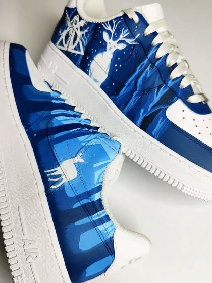 The other side of the Harry Potter sneakers, featuring Snape's Patronus in the Forbidden Forest. The deep blue monochrome palette creates a mystical, moody atmosphere.