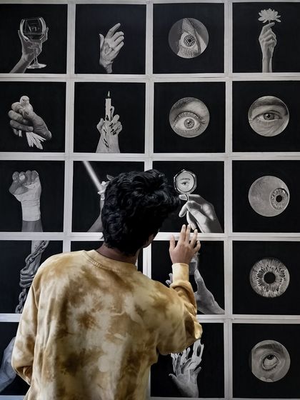 Another perspective of me with the finished series. The eye drawings in particular create interesting focal points within the larger grid.