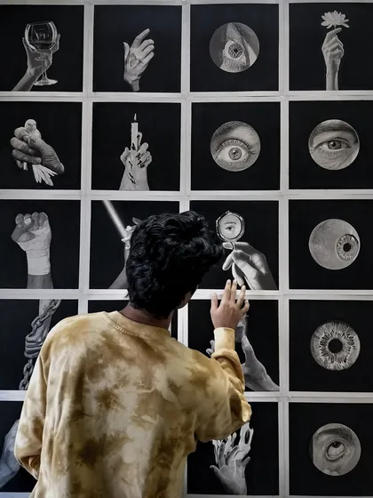 Another perspective of me with the finished series. The eye drawings in particular create interesting focal points within the larger grid.