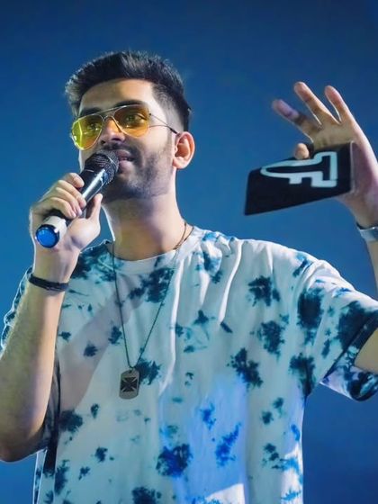 Holding up the Techfest logo, a symbol of one of Asia's largest science and technology festivals, which I am proud to host.