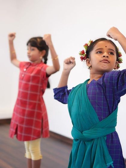 Young students practicing with focus and determination. My children's classes are designed to be fun while instilling the discipline and grace of classical dance.