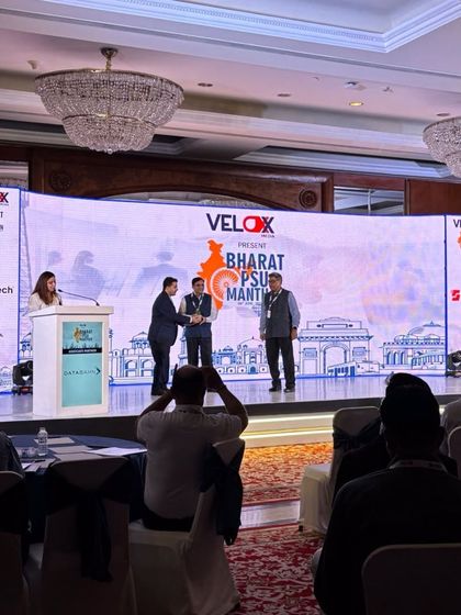 A moment from the stage at Bharat PSU Manthan 2025, where we were recognized for our contributions to public sector innovation.