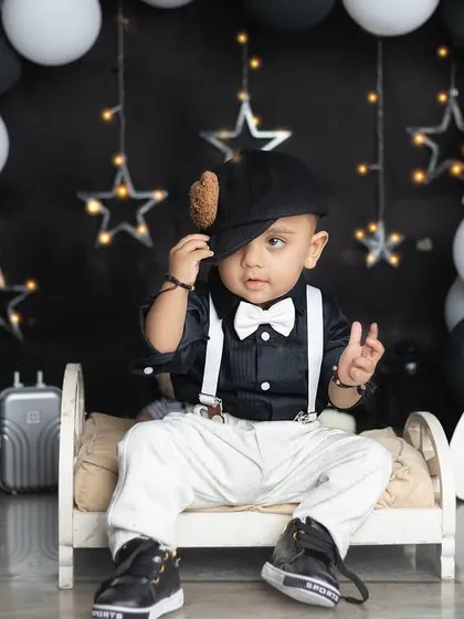 A touch of personality with a cap! I love adding little props to make the photos unique to your child.