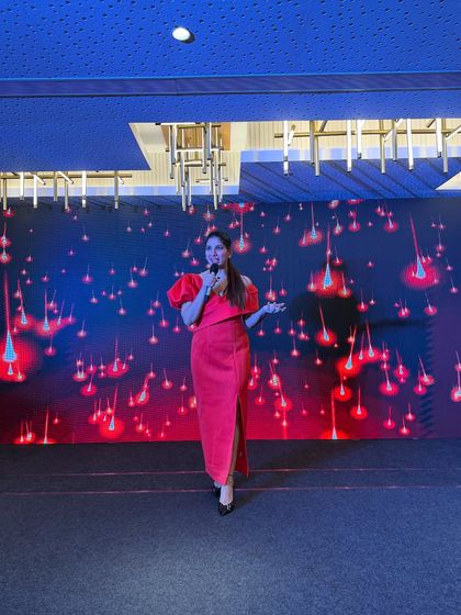 On stage at the Orica conference. Even with a simple stage setup, I bring energy and presence to fill the space.