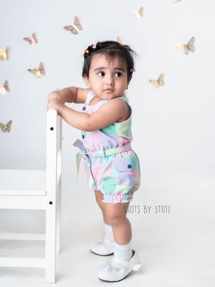 This 10 month old fashionista is ready for her close up. Milestone sessions are a great opportunity to dress up and capture some stylish portraits of your growing baby.