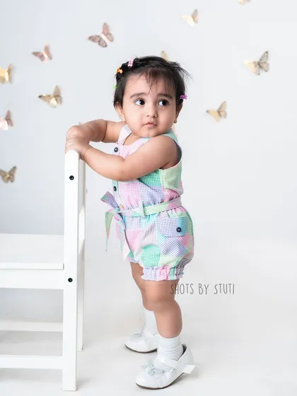 This 10 month old fashionista is ready for her close up. Milestone sessions are a great opportunity to dress up and capture some stylish portraits of your growing baby.