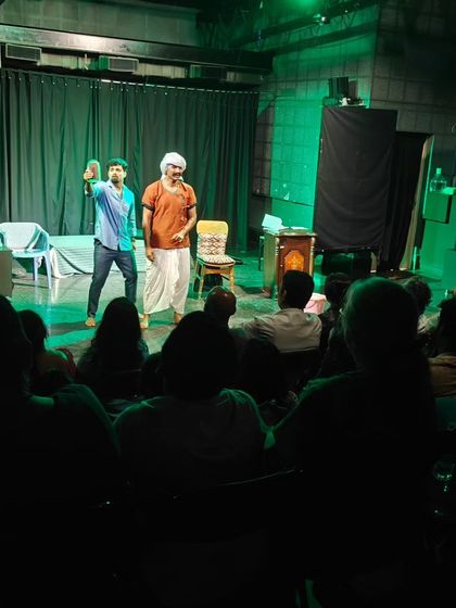 Another moment from the same comedic play, capturing the actors' perfect timing and physical comedy skills learned in the workshop.